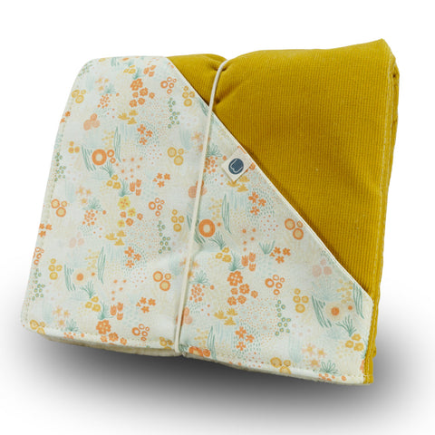 Wickelunterlage aus Biowolle Cord x "heller Floraling“